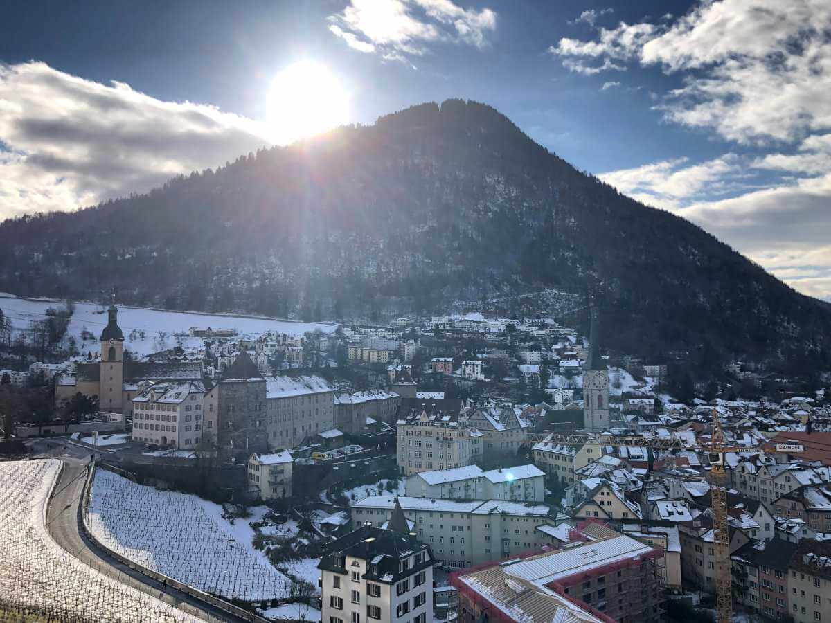 Chur in Switzerland covered in snow on a sunny day.